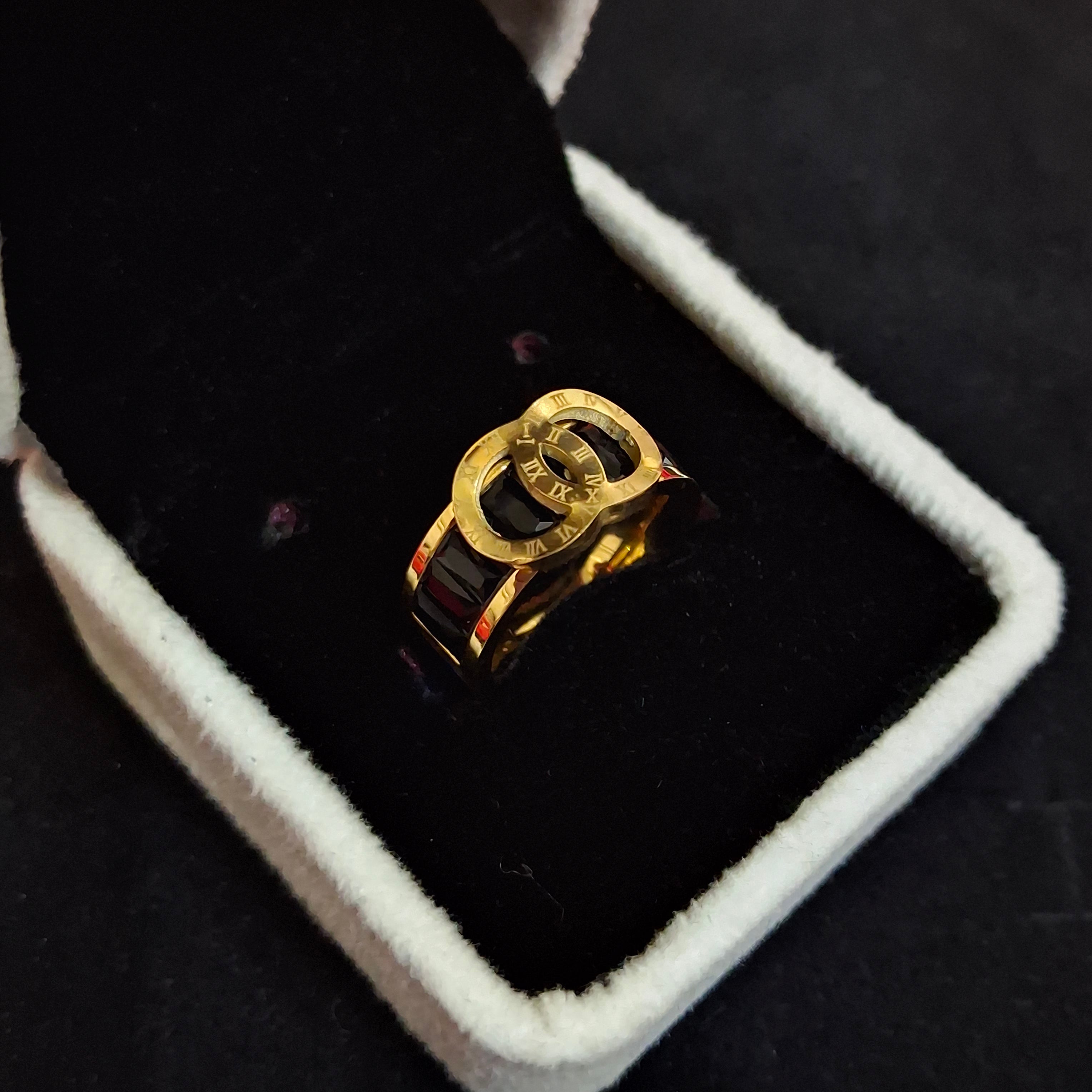 Interlocked Roman Numeral Baguette Ring